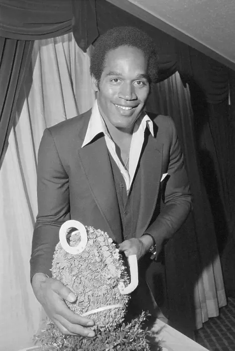 Framed Print : O.J. Simpson Poses With A Football Framed Print : O.J. Simpson Poses With A Football