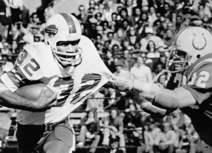 Framed Print : O.J. Simpson Running with the Football