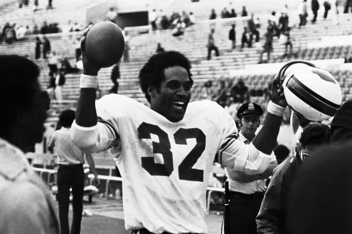 Framed Print : O.J. Simpson After Setting a new Game Rushing Record Framed Print : O.J. Simpson After Setting a new Game Rushing Record