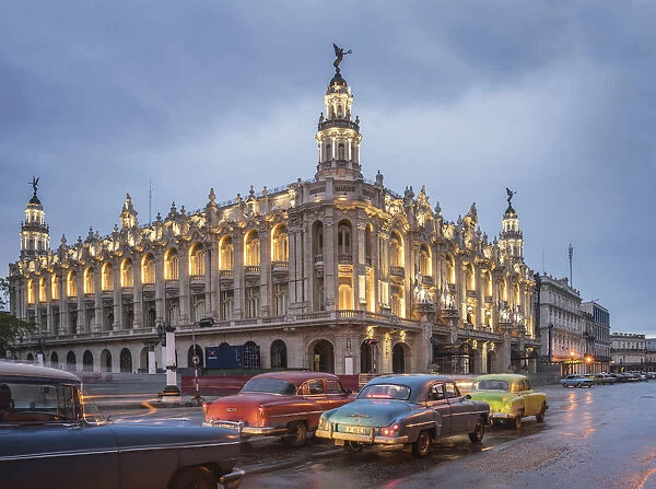 Old American cars and the Cuban National Theater