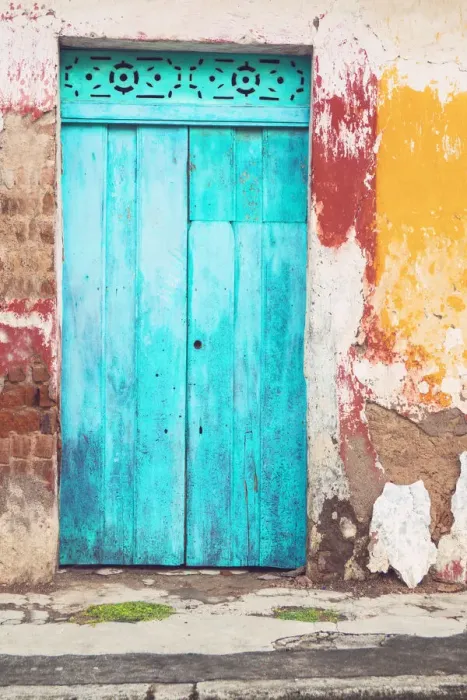 Framed Print : Old and beautiful turquoise door and old multicorored facade at house Framed Print : Old and beautiful turquoise door and old multicorored facade at house