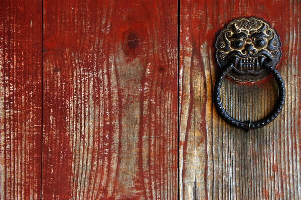 Old door and knocker at a temple in Gyeongju
