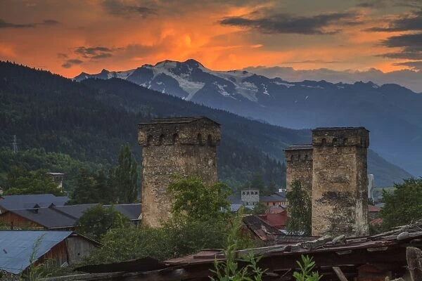 Old Georgian town with towers at sunset. Svaneti