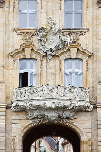 An Old House With An Ornate Balcony
