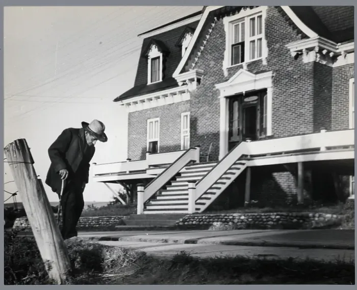Framed Print : Old Man In Front Of House Framed Print : Old Man In Front Of House