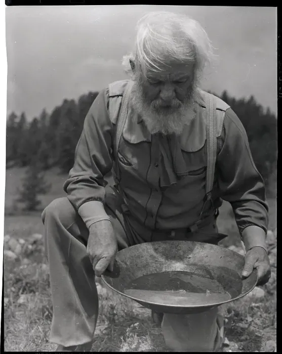 Framed Print : Old-Time Gold Prospector with Pan in Hands