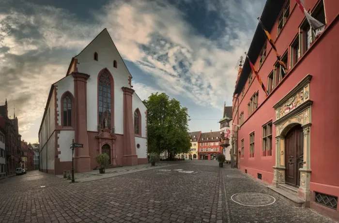 Framed Print : Old Town Hall and St. Martin is chruch in Freiburg city, Germany Framed Print : Old Town Hall and St. Martin is chruch in Freiburg city, Germany