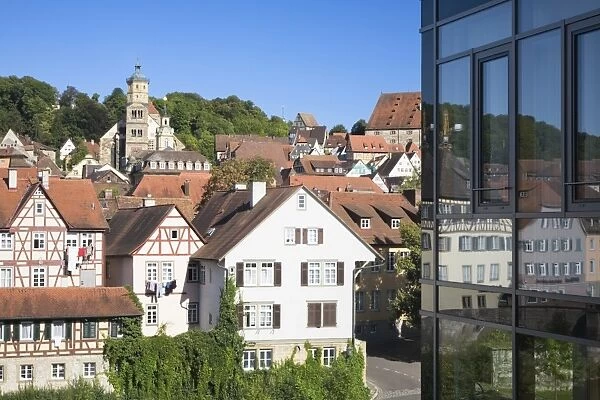 The old town is reflected in the glass facade of a modern building, Schwaebisch Hall, Hohenlohe, Baden-Wuerttemberg, Germany, Europe