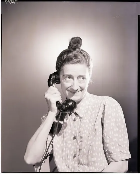 Framed Print : Old Woman Using Telephone Framed Print : Old Woman Using Telephone