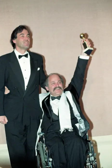 Framed Print : Oliver Stone and Ron Kovic Holding Golden Globe Award Framed Print : Oliver Stone and Ron Kovic Holding Golden Globe Award