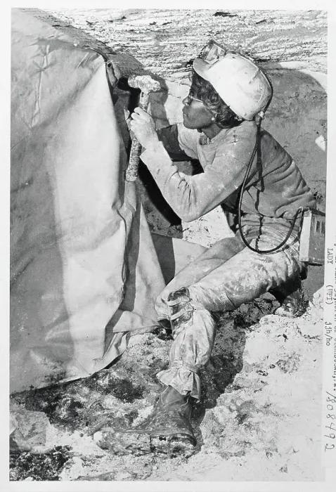Framed Print : Olivia Rowe Excavating from Rock Formation Framed Print : Olivia Rowe Excavating from Rock Formation
