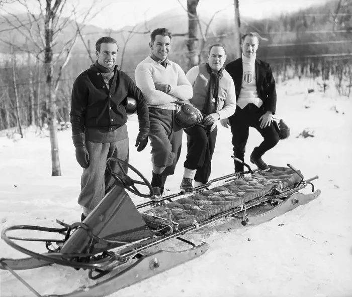 Framed Print : Olympic Bobsled Team In Front Of Bobsled