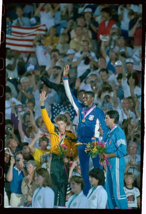 Framed Print : Three Olympic Long Jump Medal Winners in Front of Crowd Framed Print : Three Olympic Long Jump Medal Winners in Front of Crowd