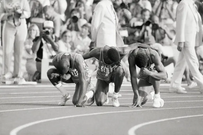 Framed Print : Olympic Medal Winners Pray in Thanks Framed Print : Olympic Medal Winners Pray in Thanks