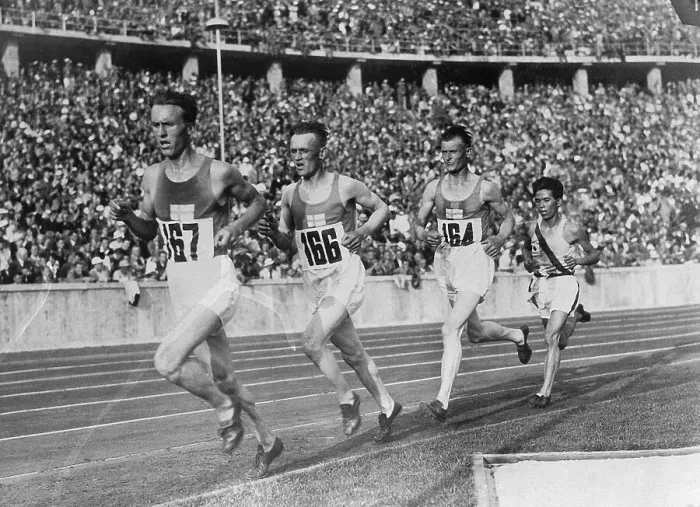 Framed Print : Olympic Runners Cross Finish Line Framed Print : Olympic Runners Cross Finish Line