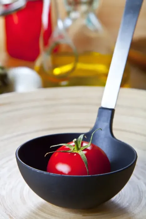 Framed Print : Organic tomato in a soup ladle Framed Print : Organic tomato in a soup ladle