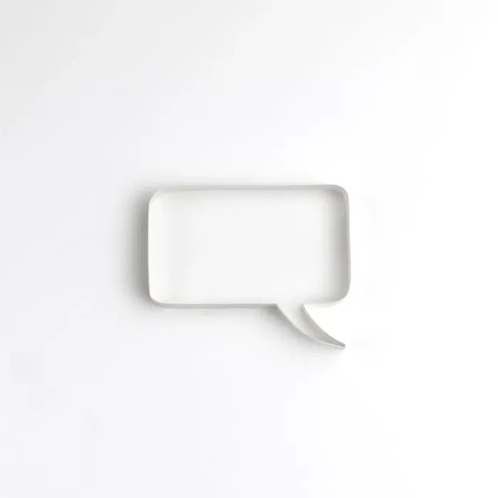 Framed Print : Origami. Speech bubble made origami style on a white backdrop Framed Print : Origami. Speech bubble made origami style on a white backdrop