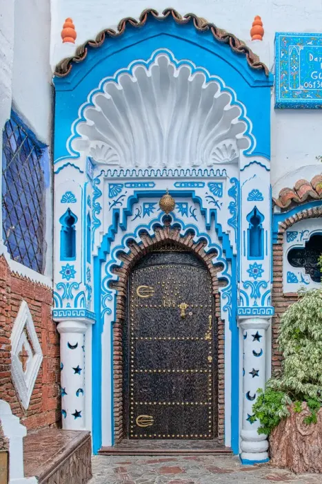 Framed Print : An ornate blue and white doorway in the Blue City of Chefchaouen Framed Print : An ornate blue and white doorway in the Blue City of Chefchaouen