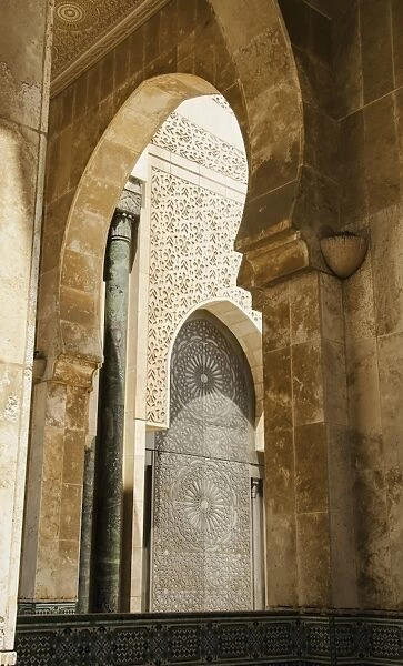 Ornate Facade On Walls With Arches In Hassan Ii Mosque