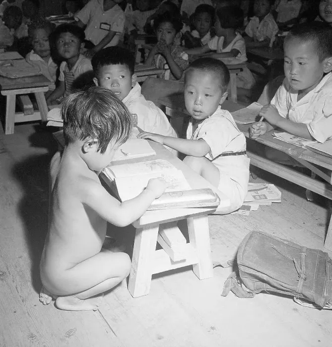 Framed Print : Orphan in Wartime Classroom Framed Print : Orphan in Wartime Classroom
