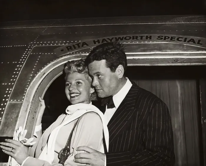 Framed Print : Orson Welles and Rita Hayworth Posing at Airplane Doorway Framed Print : Orson Welles and Rita Hayworth Posing at Airplane Doorway
