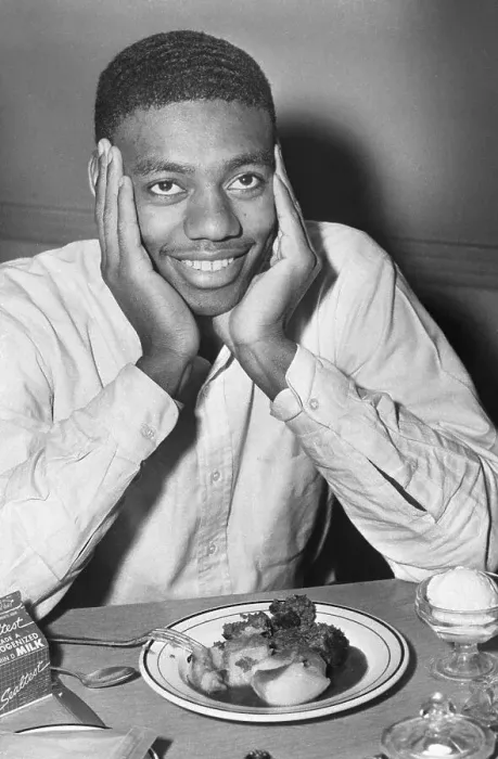 Framed Print : Oscar Robertson Smiling Over Food Framed Print : Oscar Robertson Smiling Over Food