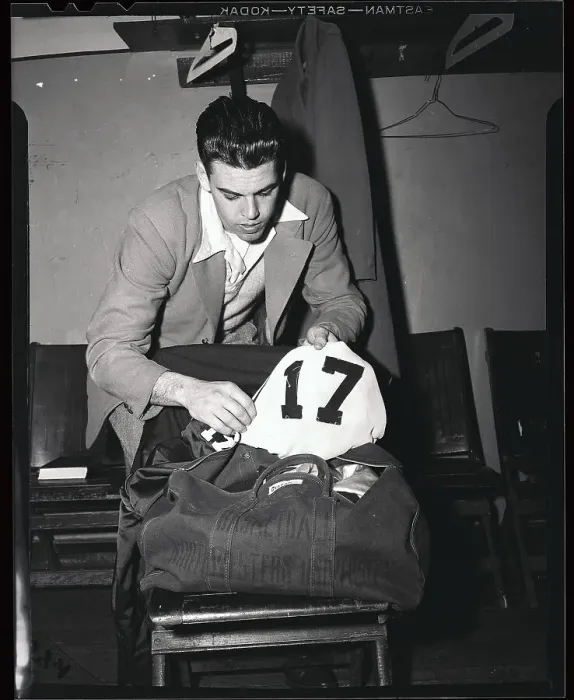Framed Print : Otto Graham Placing Uniform Away Framed Print : Otto Graham Placing Uniform Away
