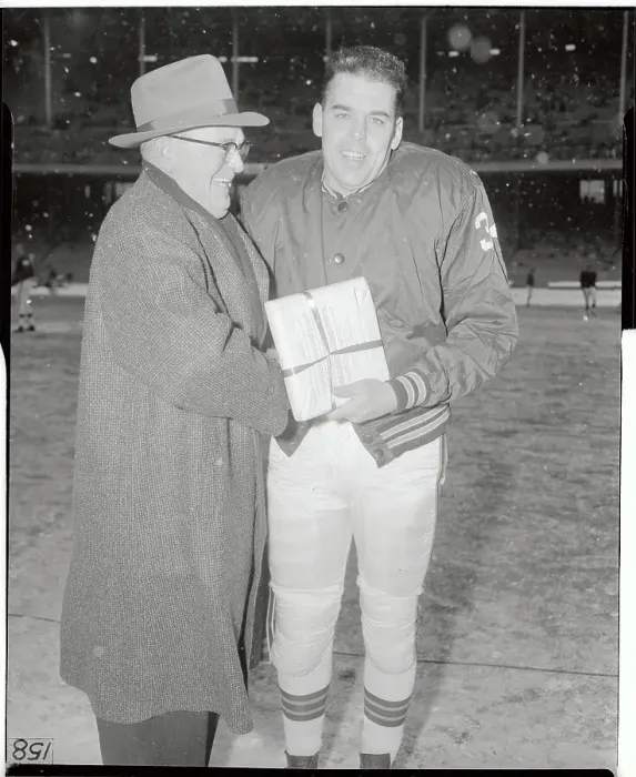 Framed Print : Otto Graham Posing with John H. Borland on Football Field Framed Print : Otto Graham Posing with John H. Borland on Football Field