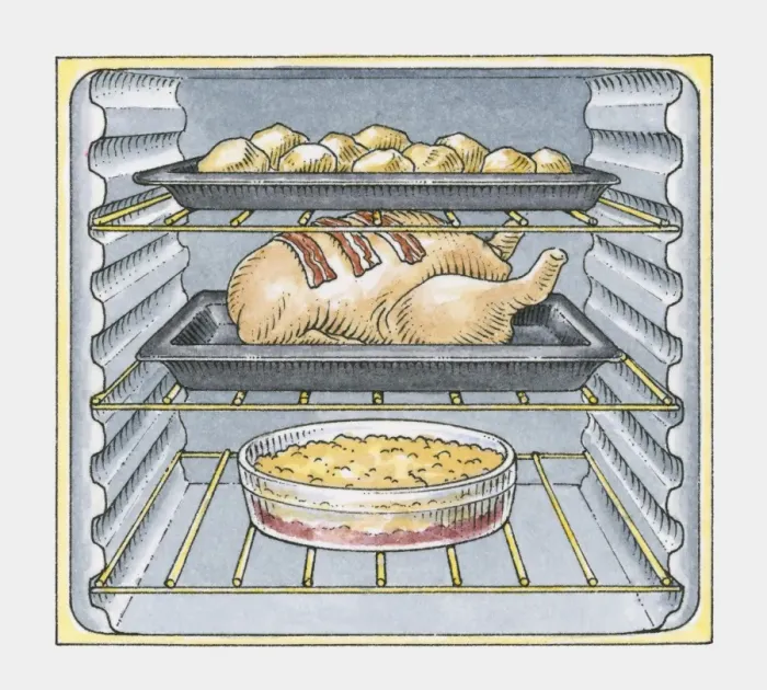 Framed Print : Oven filled with trays of roast potatoes, roast chicken, and crumble pudding Framed Print : Oven filled with trays of roast potatoes, roast chicken, and crumble pudding