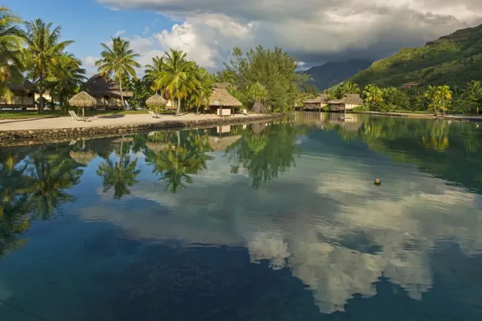 Framed Print : Overwater bungalows, evening atmosphere, Moorea, French Polynesia Framed Print : Overwater bungalows, evening atmosphere, Moorea, French Polynesia