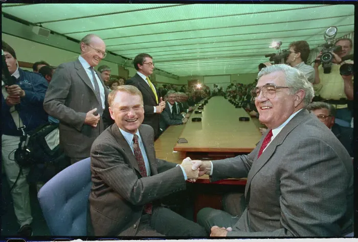 Framed Print : Owen Bieber and Harold Poling Shaking Hands