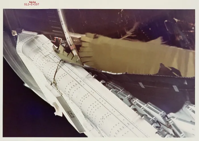 Framed Print : OWS SAS. Close-up view of damaged and partially deployed OWS SAS wing showing Framed Print : OWS SAS. Close-up view of damaged and partially deployed OWS SAS wing showing