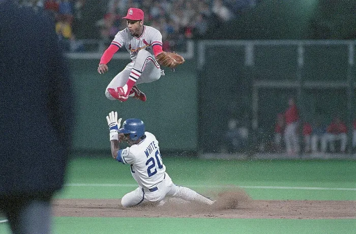 Framed Print : Ozzie Smith Leaping for Throw