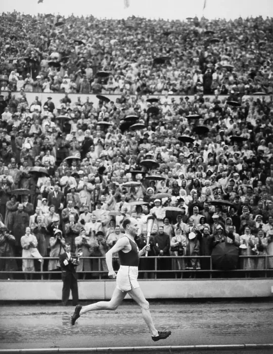 Framed Print : Paavo Nurmi Running with Olympic Torch Framed Print : Paavo Nurmi Running with Olympic Torch