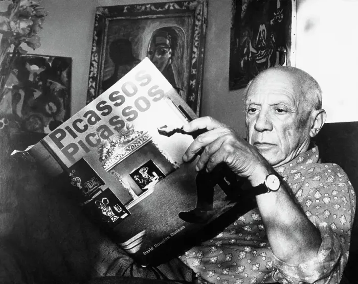 Framed Print : Pablo Picasso Thumbs Through Book