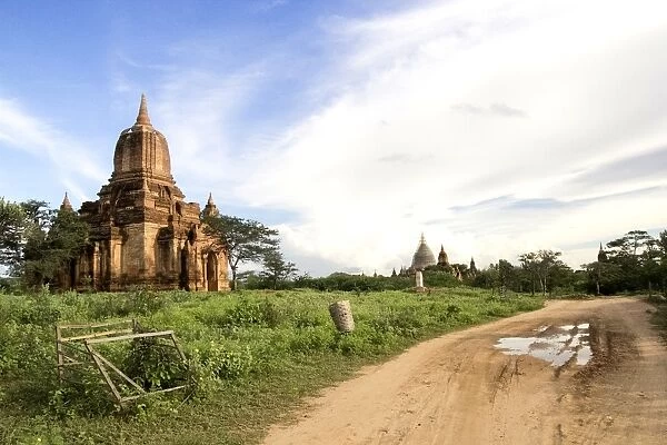 Pagoda in Bagan. A pagoda beside the muddy road cause by the rain day before