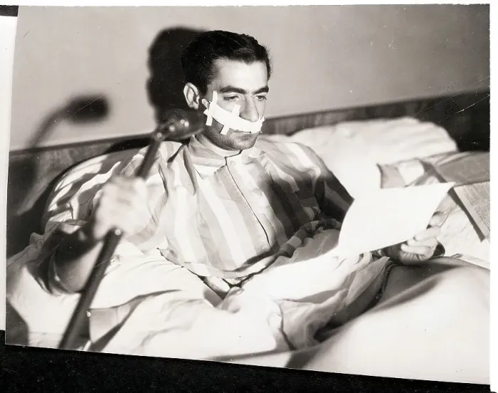 Framed Print : Pahlevi in Hospital Bed with Lip Cast Framed Print : Pahlevi in Hospital Bed with Lip Cast