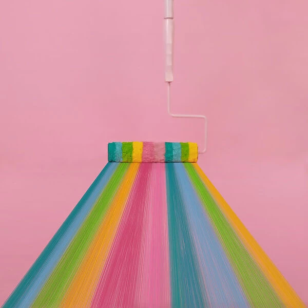Paint roller with rainbow stripes