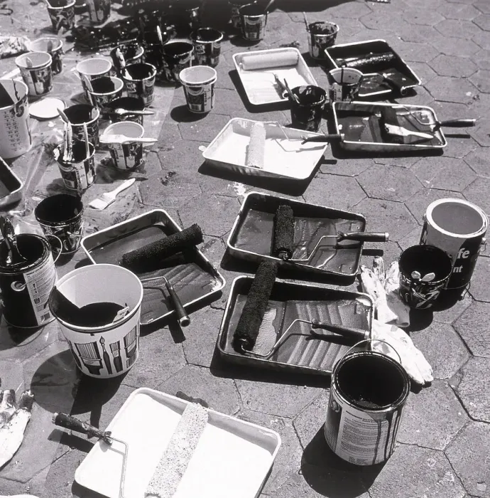 Framed Print : Paint supplies spread out on street Framed Print : Paint supplies spread out on street