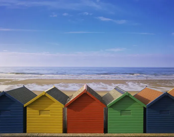 Framed Print : Painted Beach Huts in a Line, Whitby, England, UK Framed Print : Painted Beach Huts in a Line, Whitby, England, UK