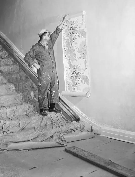 Framed Print : Painter Holding Wallpaper in Gracie Mansion Framed Print : Painter Holding Wallpaper in Gracie Mansion