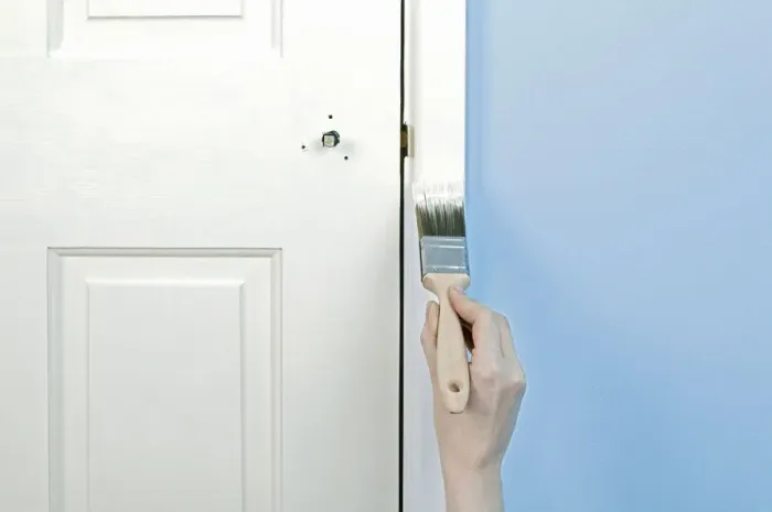 Framed Print : Painting a door architrave, close up