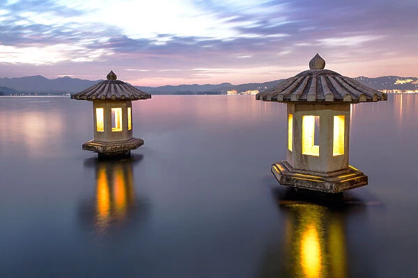 A pair of stone lanterns on the West Lake, Hangzhou