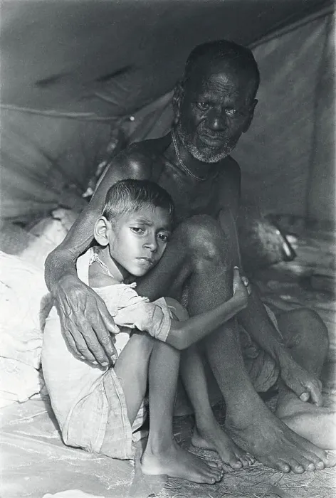 Framed Print : Pakistani Boy Clutching Grandfather Framed Print : Pakistani Boy Clutching Grandfather