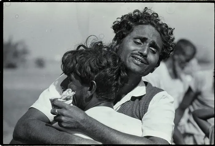 Framed Print : Pakistani Man Sobs On Shoulder Of Friend Framed Print : Pakistani Man Sobs On Shoulder Of Friend