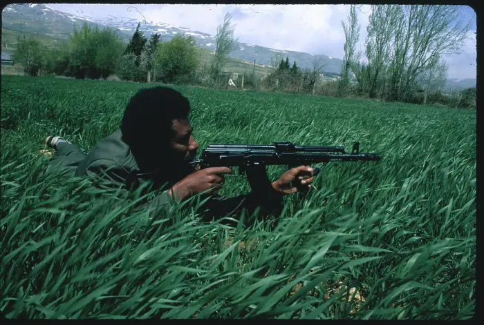 Framed Print : Palestinian Soldier in Position and Aiming with His Rifle Framed Print : Palestinian Soldier in Position and Aiming with His Rifle