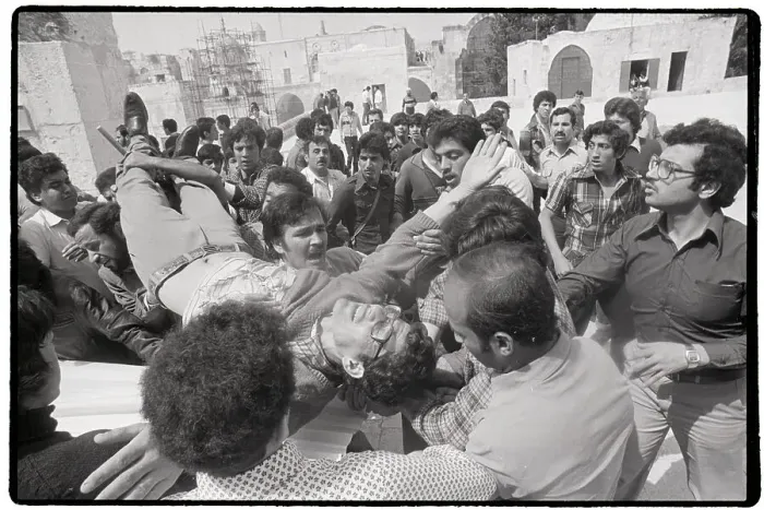 Framed Print : Palestinians Carrying Wounded Man Framed Print : Palestinians Carrying Wounded Man