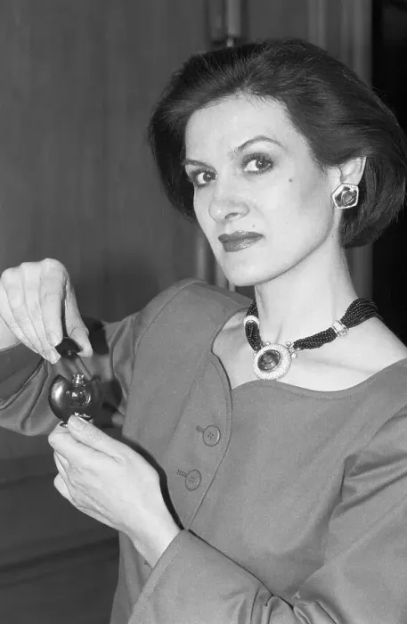 Framed Print : Paloma Picasso Holding Perfume Bottle Framed Print : Paloma Picasso Holding Perfume Bottle