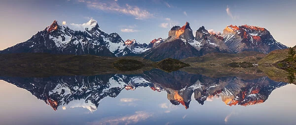 Panorama of a colorful sunset in Torres del Paine, Chile