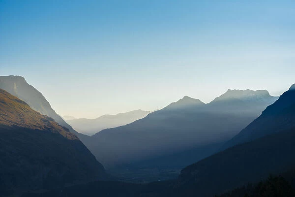 Panorama on a foggy dawn from the Mont-Cenis lake, Savoie, France